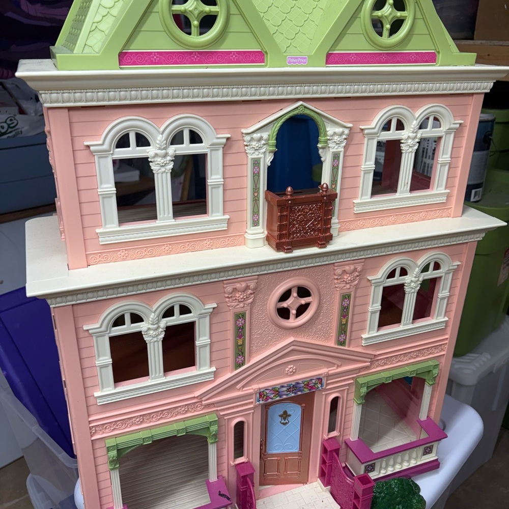 Fisher-Price Pink and Green Dollhouse with Multi-Story Design